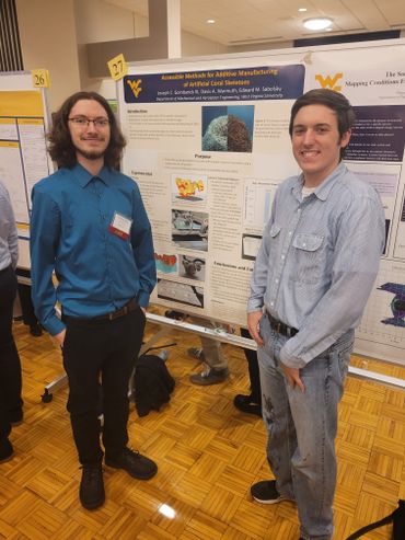 WVU SURE student Joseph Gombarick and his graduate student mentor Davis Warmuth attending the 16th Annual Summer Undergraduate Research Symposium